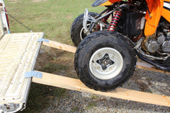 STEEL LOADING RAMP END KIT being used on truck with loading a 4 wheeler