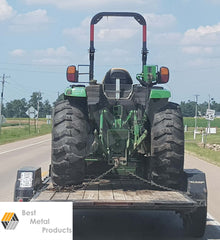 1/4" x 12 ft TOW CHAIN WITH HOOKS in use on a trailer, hauling a tractor