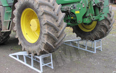 Loading service ramps being used with heavy duty tractors